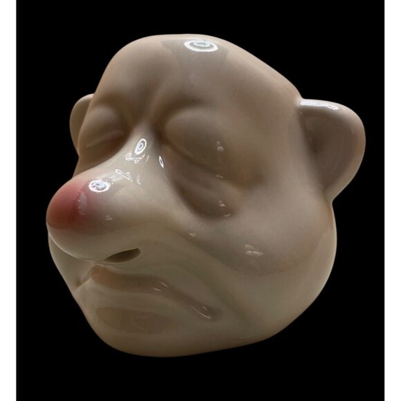 Adorable and Fun Running Nose Egg Seperator Pottery Man